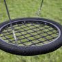 Single Swing (BNS 90cm) with black woven rope seat and metal frame, designed for playground use.
