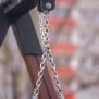 Close-up of metal chains hanging from the frame of the Single Swing (BNS 90cm) playground equipment.
