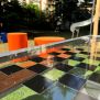 HPL Bench Chess and ludo game with black and brown checkered board and orange stools.