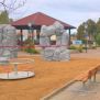 Bench, Steel Contruction with wooden seats and metal frames placed along a paved playground area