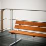 Bench, Steel Contruction with wooden slats and metal frame on a deck railing.