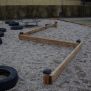 Wooden Balance on Sand